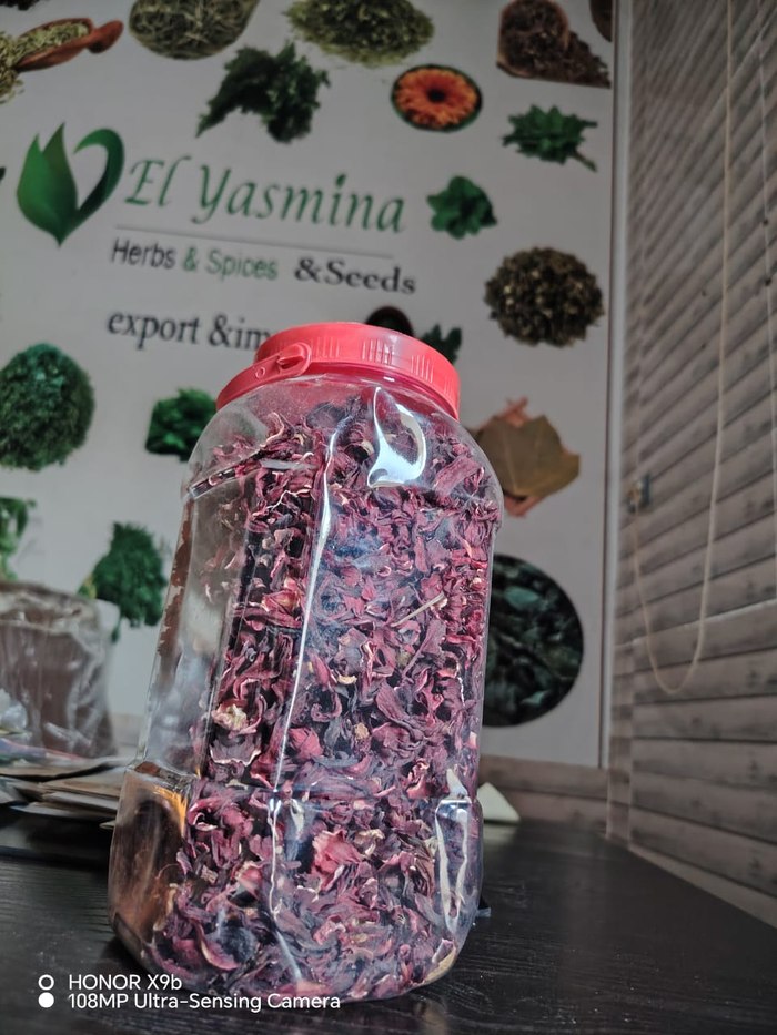 Dried hibiscus in an El Yasmina screw-top retail jar