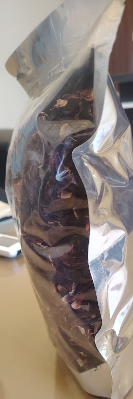 Dried hibiscus in a resealable foil stand-up pouch